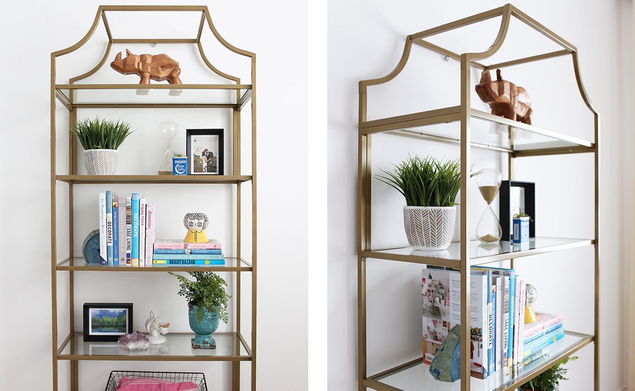 Gold metal and glass tower bookcase