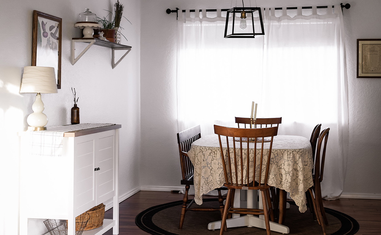 Dining area with cottage-style storage cabinet