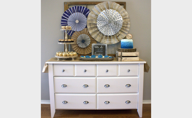 multipurpose dresser used as baby shower buffet display