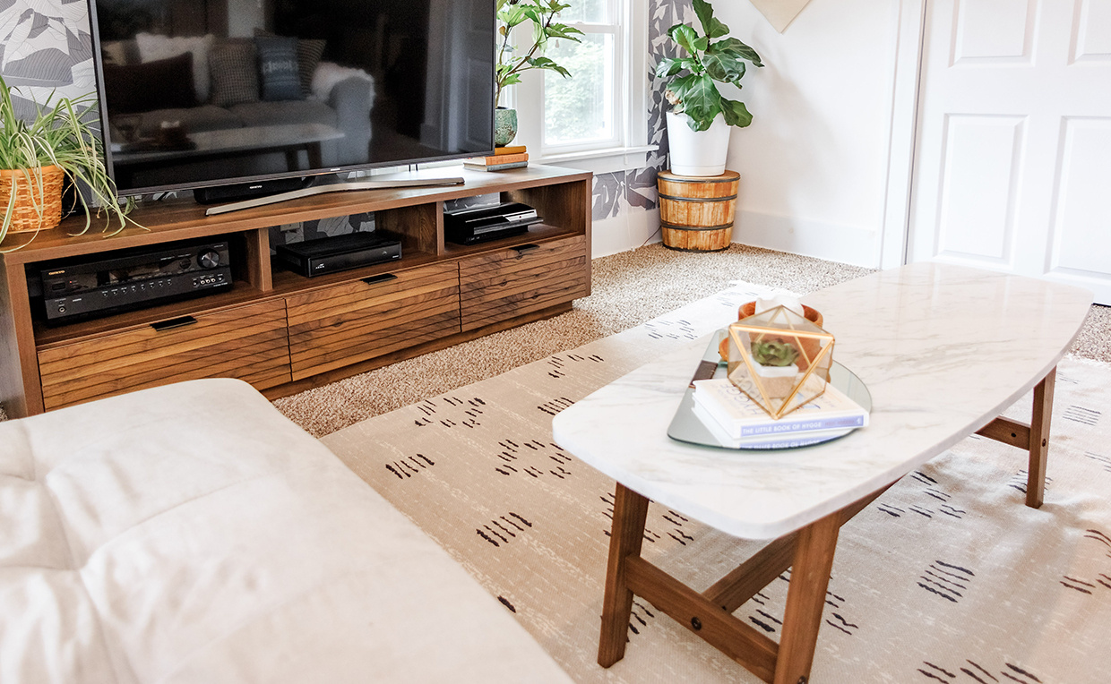 TV stand with TV, table and rug, attic