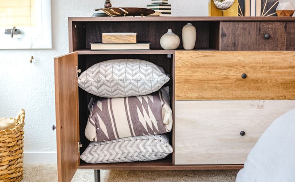 Door and cubby storage in Eden Rue Credenza bedroom storage