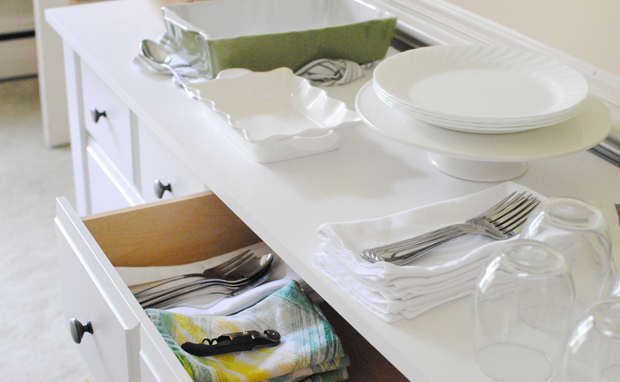 multipurpose dresser used as china cabinet for dish storage