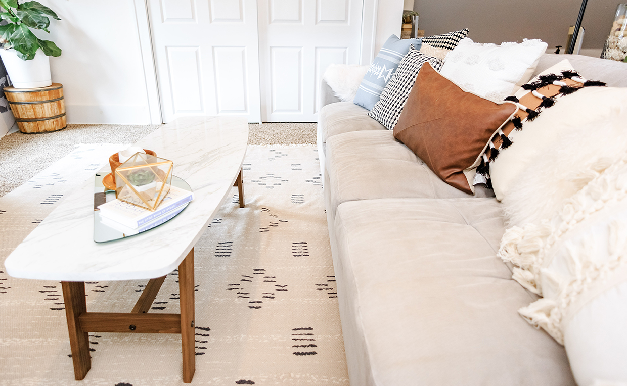 Couch and coffee table with rug