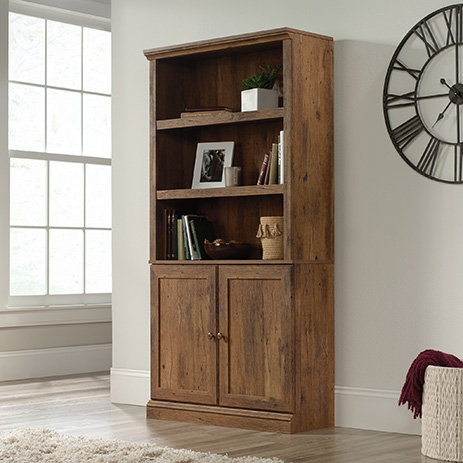 tall narrow bookcase with doors